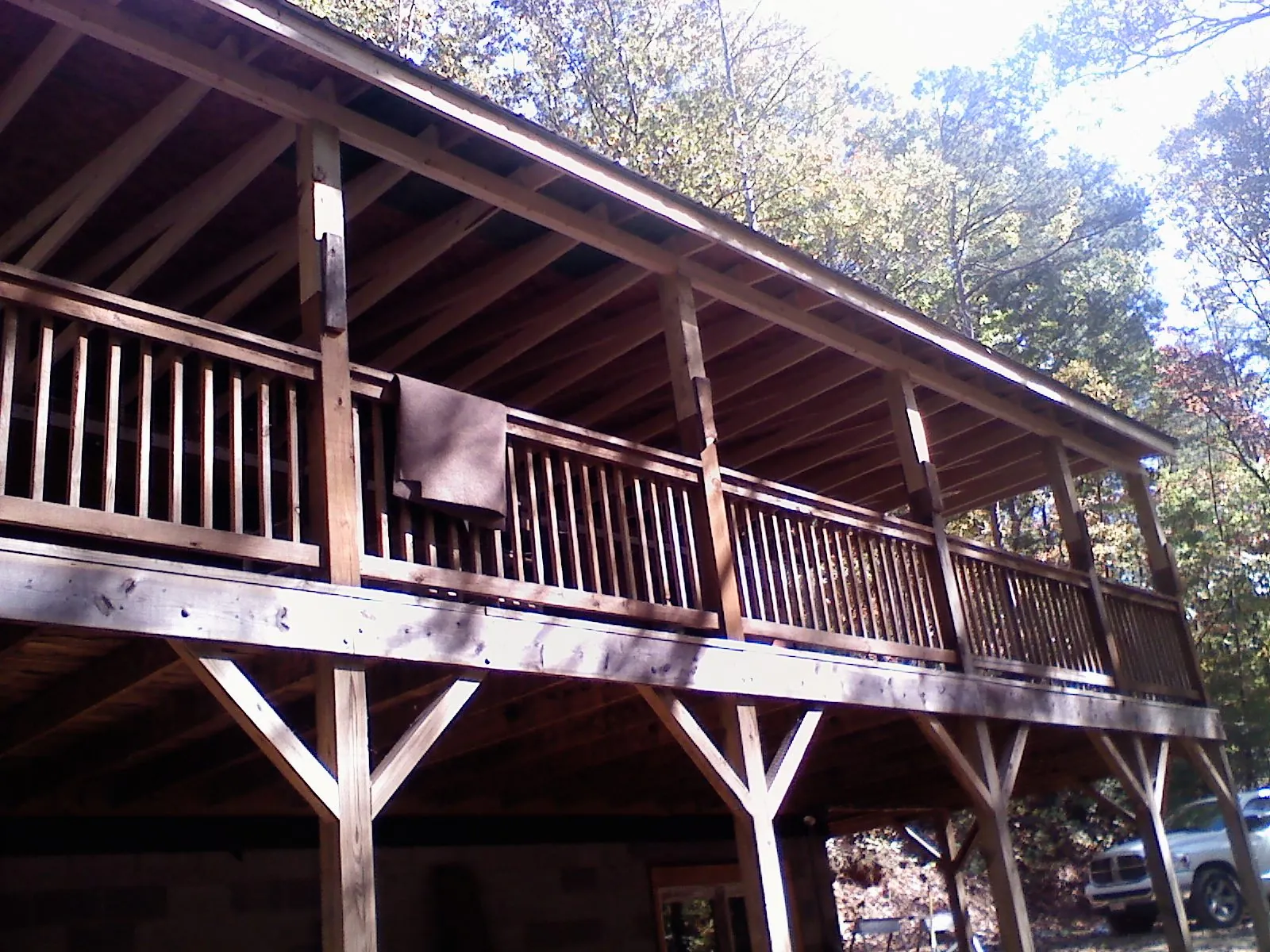 Timber framing under a new elevated porch and deck — Roof Leak Repair in Shelter Island Heights by Roofing Brothers